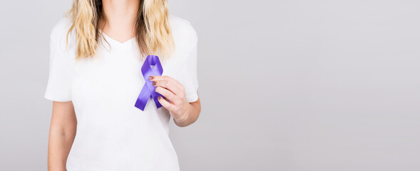 Woman holding purple ribbon on white background, closeup with space for text. Alzheimer's disease,...