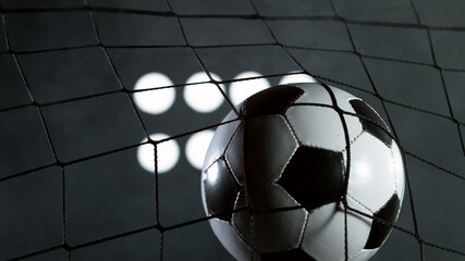 Soccer ball flying into net, goal success concept.