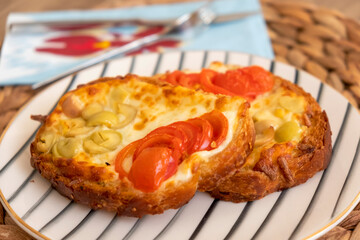 bread baked mozzarella with tomato and olive