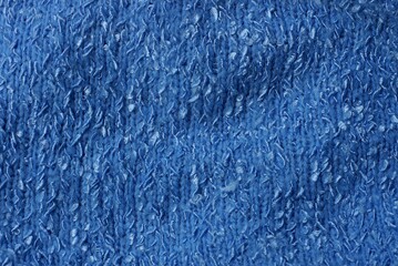 light blue texture of woolen crumpled clothing fabric