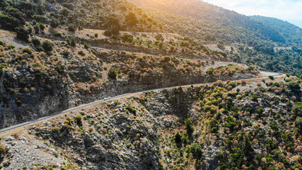 A mediterranean serpentine road in mountains
