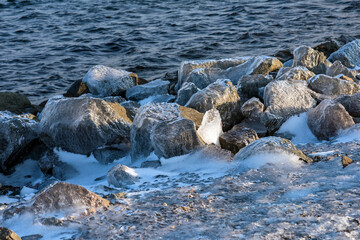Ice rain series: ice-coverd rocks on the beach