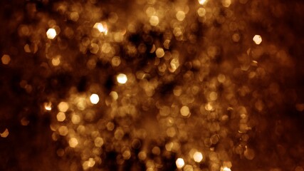 Full frame defocused and Bokeh particle snow and tinsel glow. Festive golden and white gala glitter abstract bokeh background for celebration, Christmas New Year and luxury party concepts