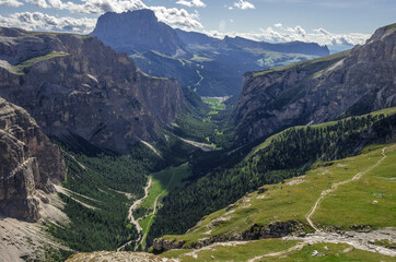 Fototapeta premium Vallunga (Long Valley) with Sassolungo and Sciliar mountain in the background, as seen from Refugio Puez, Province of Bolzano, Dolomites, South Tirol, Italy.