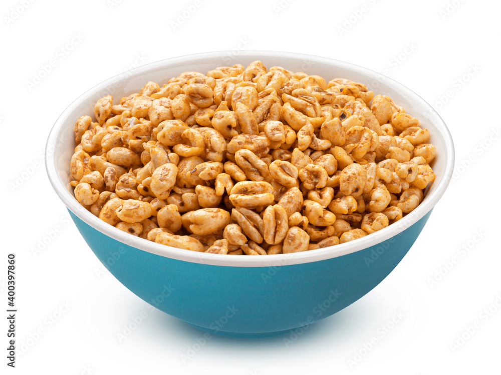 Wall mural puffed wheat cereal in bowl isolated on white background