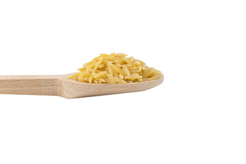 In Greece called kritharaki. In Italy called Orzo. Rice shaped pasta in wooden spoon isolated on white background.Type of pasta. Food ingredient.