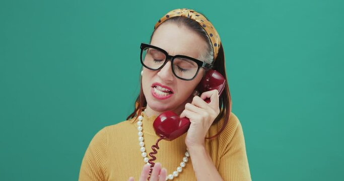 Funny woman speaking on a telephone.