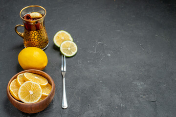 front view fresh lemon slices with tea on dark background sour citrus fruits juice