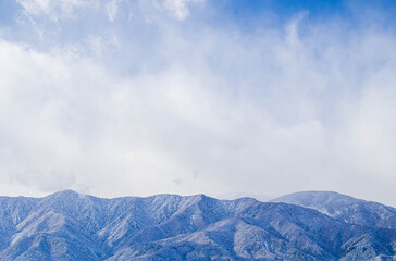 雲がちな冬の北アルプス