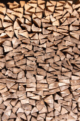 Wood logs stacked in a pile - pattern