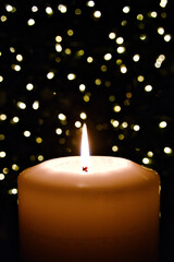 Candle with dark and bokeh background