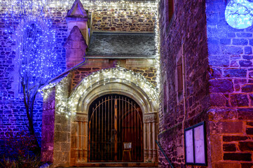 Blue illumination of the stone church