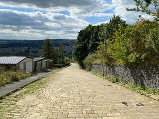 Old cobbled street, near to, Ploughcroft Lane, leading down into, Halifax, Yorkshire, UK