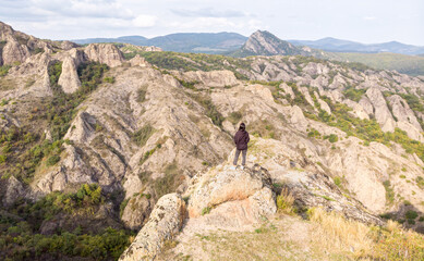 Panoramic view Birtvisi canyon rock formations with tourist standing on the rock