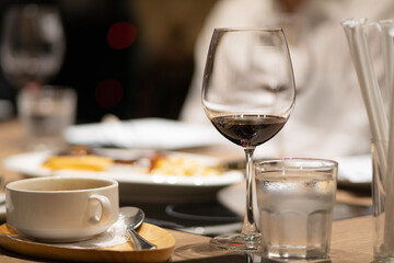 Glass on the dining table in a vintage tone banquet