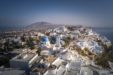 Fototapeta premium imerovigli, Santorini island with colorful volcanic cliffs and deep blue sea aerial view