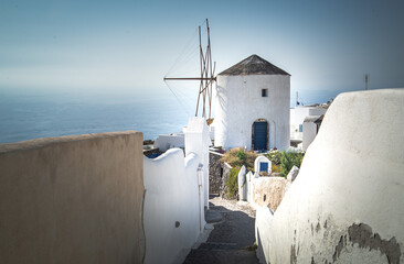 Greece Traveling. View of Greek Traditional Colorful Houses and Windmills of Oia or Ia at Santorini Island in Greece