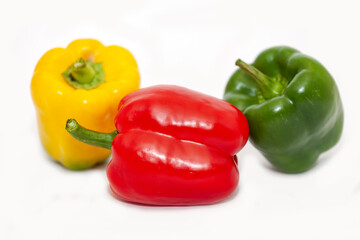Red, green and yellow bell peppers