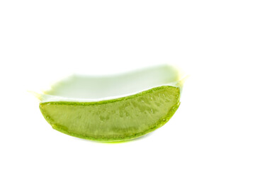 Selective focus. Aloe vera leaf slice isolated on white background.