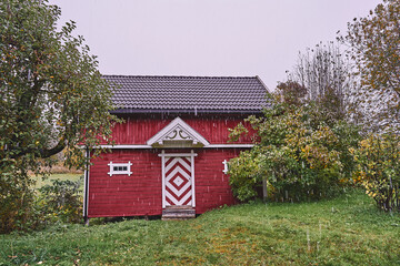 Fototapeta na wymiar farms traditional food storage house in spring while snowing