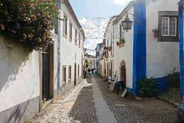 Obidos traditional houses and streets in Portugal on a sunny day