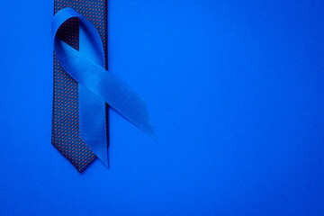 Prostate care. Awareness prostate cancer of men health in November. Blue ribbon, fashion tie...