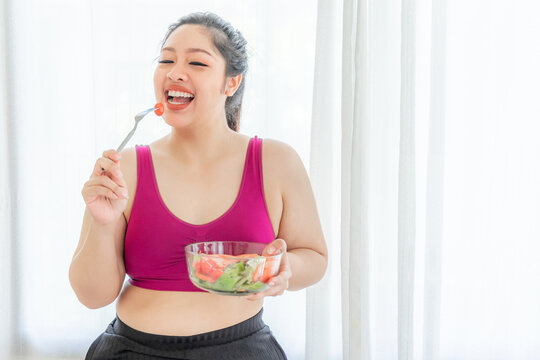 Overweight Asian Plump Female ,fat Women , Fat Girl , Chubby, Eating Vegetable Salad - Lifestyle Woman Diet Weight Loss Overweight Problem Concept