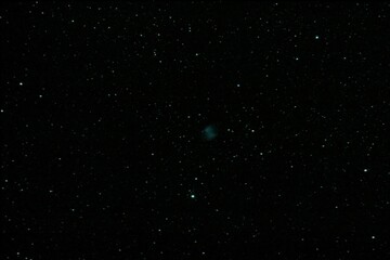 An astrophotograph of the Dumbbell nebula (also known an Apple Core Nebula, Messier 27, M27 and NGC 6853) in the constellation Vulpecula