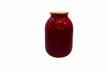 Jar with canned delicious cherry compote