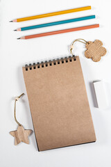 Brown notepad spiral wooden objects bright pencils stationery