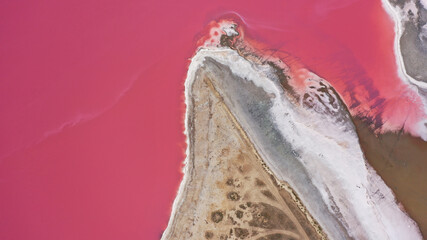 Aerial view of a pink salt lake. Azov Ukraine. Drone photo. pink salt texture