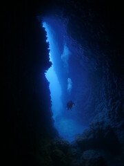 scuba divers are exploring the caves and caverns underwa