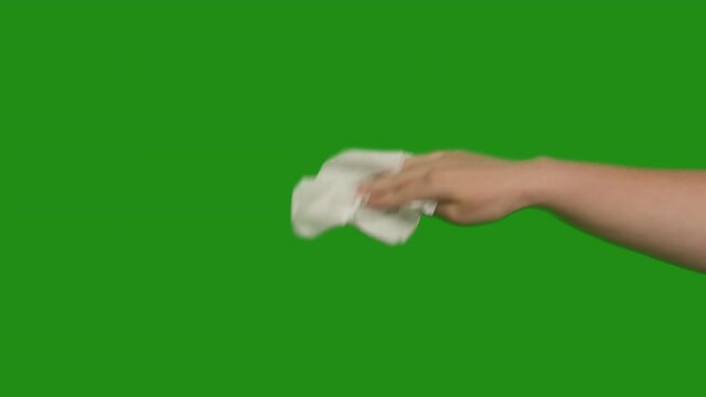 Female hand with a white napkin, wipes, close-up, chromakey
