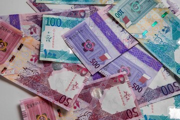 Doha, Qatar - December 19 , 2020:Qatar  Currency New .Qatari Riyal ,Notes,500,100,50 on white background 