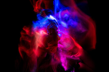 Obraz premium light painting portrait, new art direction, long exposure photo without photoshop, light drawing at long exposure 