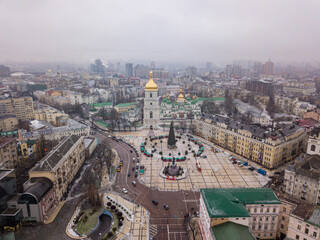 Naklejka premium Aerial drone view. Sophia Church in Kiev. New Year tree in the square near the church.