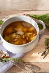 Homemade vegetarian mushroom soup with barley and vegetables