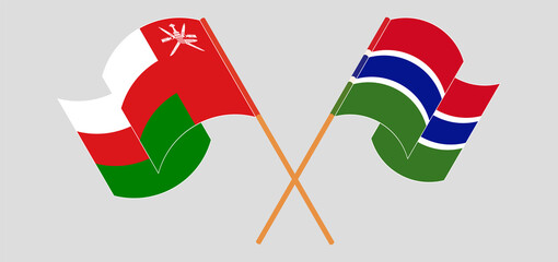 Crossed flags of Oman and the Gambia