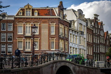 Obraz premium traditional houses of Amsterdam, bridge and canal