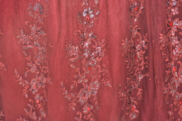 red christmas background. red scarlet fabric with lace for bridesmaid wedding dress