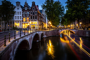 long exposure in the night in amsterdam, canals and bridges
