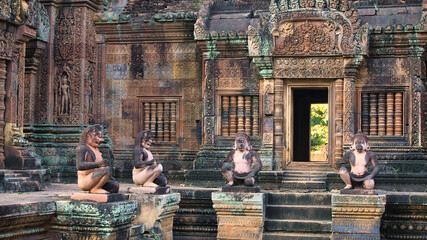 Siem Reap, Cambodia - December 2015: Banteay Srei temple ruins with monkey statues, Angkor