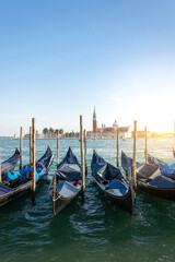 Fototapeta premium Grand canal with gondolas in travel Europe Venice city, Italy. Old italian architecture with landmark bridge, romantic boat. Venezia.