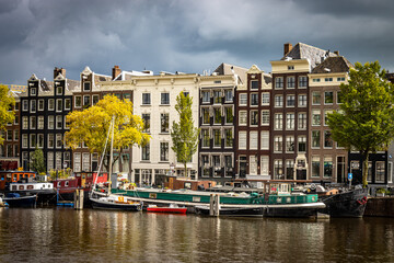 Obraz premium boats on Amstel River in Amsterdam 
