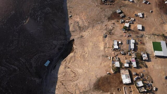 Bedouin camp Isolated in Judaean desert Aerial view
Drone footage over Bedouin outpost Close to Israeli City Maale Adumim Aerial, Israel

