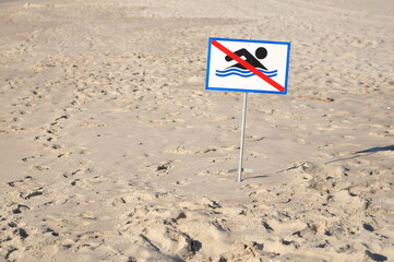 warning sign on the beach