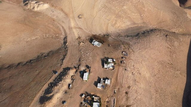 Bedouin camp Isolated in Judaean desert Aerial view
Drone footage over Bedouin outpost Close to Israeli City Maale Adumim Aerial, Israel
