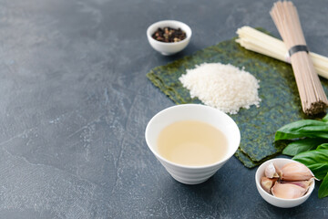 Composition with rice vinegar on table