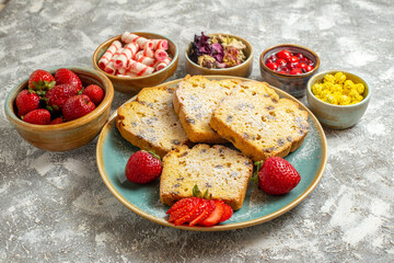front view delicious cake slices with fruits on a light background sweet pie fruit cake