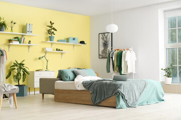 Interior of modern comfortable bedroom